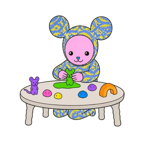 A little creature shaping playdough at a table